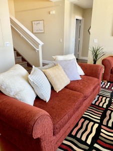One Bedroom Apartments in Baton Rouge, LA -  Model Living Room with View of Staircase 